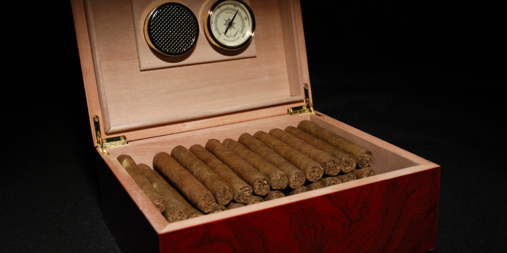 Seasoned wooden humidor filled with cigars at a stable 69-73% RH