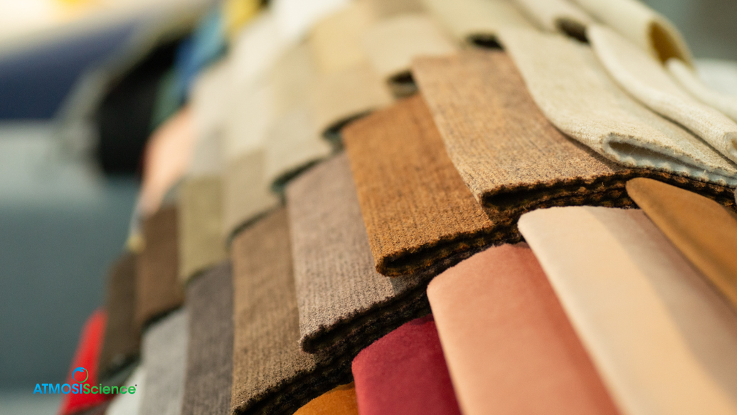 Die-cut and tag-format fiber desiccant for garment, footwear, and leather packaging