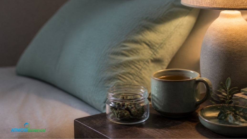 Bedside table with a jar of cannabis flower, herbal tea and soft lamp light, cannabis for sleep
