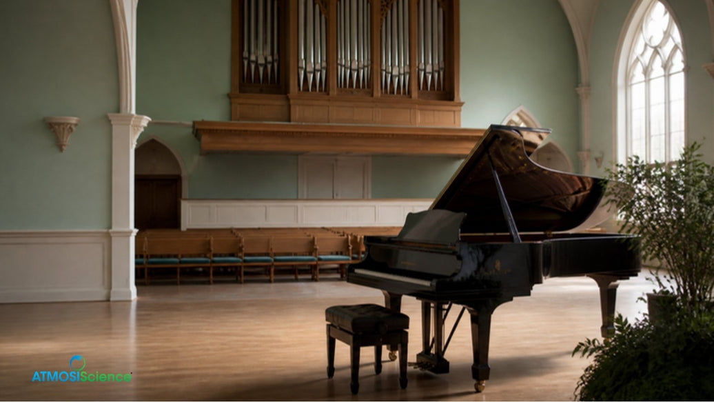 Church interior with a pipe organ and grand piano, worship space humidity for organs and pianos