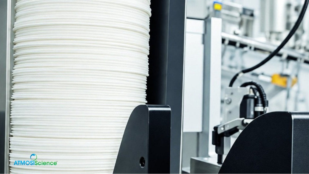 A stack of round Fiber Desiccant Cards loaded in an automated feeder
